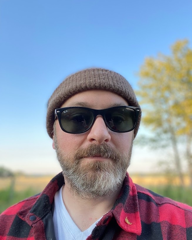 Travis Grant outdoors near Athabasca at golden hour